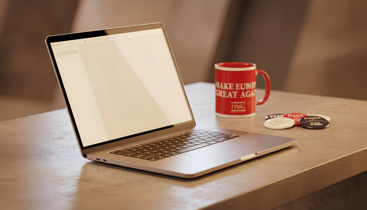Laptop on a wooden table with a red mug and coasters.
